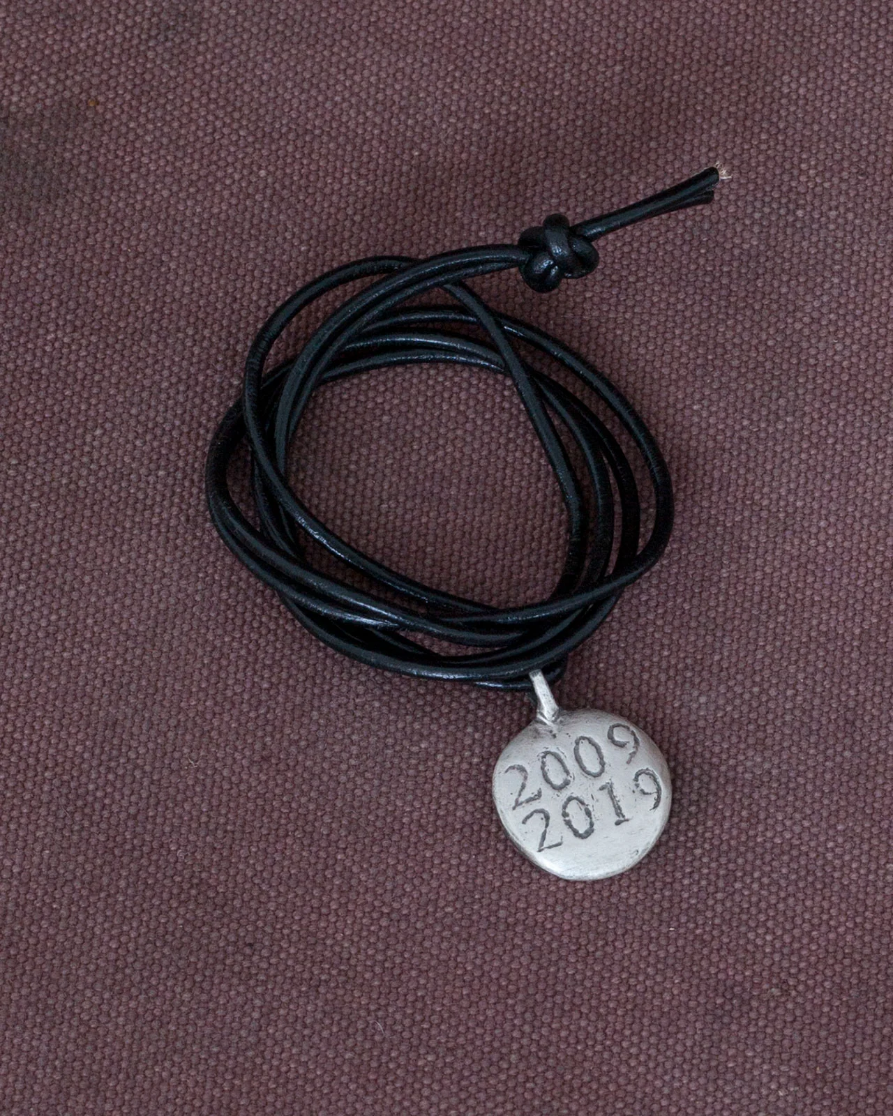 Indigofera Logo Silver Necklace - Image 3